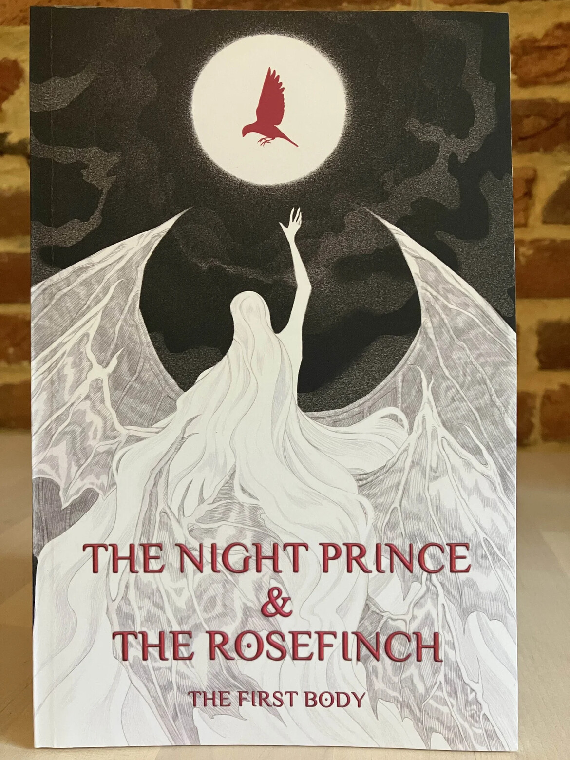 Photograph of the softcover book THE NIGHT PRINCE AND THE ROSEFINCH Photograph of the softcover book THE NIGHT PRINCE AND THE ROSEFINCH