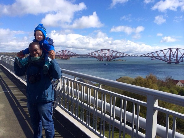 Kweku and his godson helping a friend achieve a life goal on the Forth Bridge