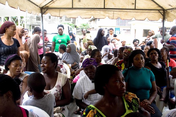 Crowd waiting for mosquito nets Crowd waiting for mosquito nets