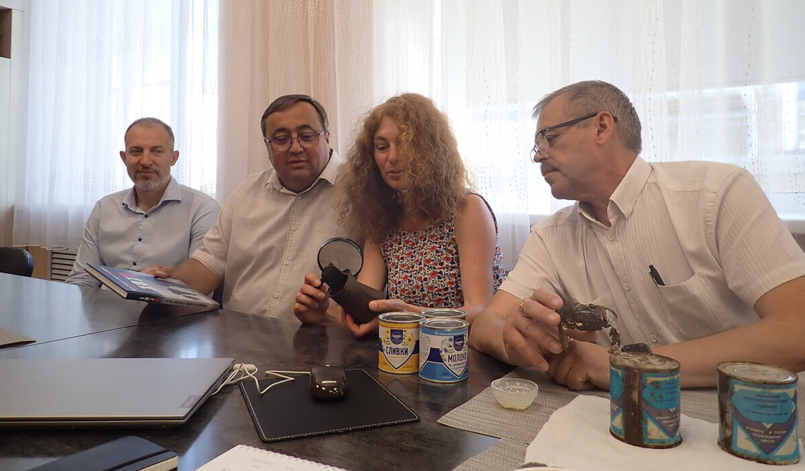 At the plant that manufactured the tin can found under the cedar.