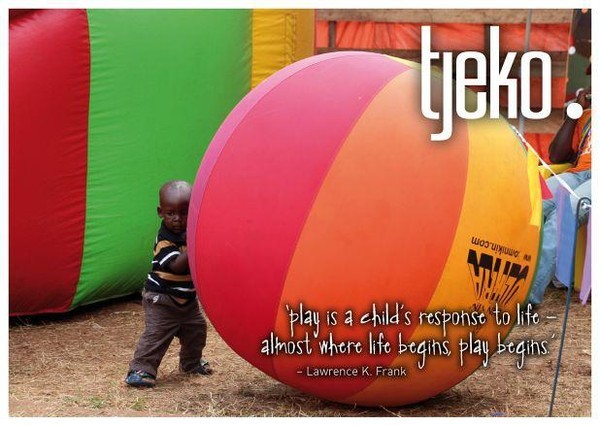 little child - big ball - play in Uganda