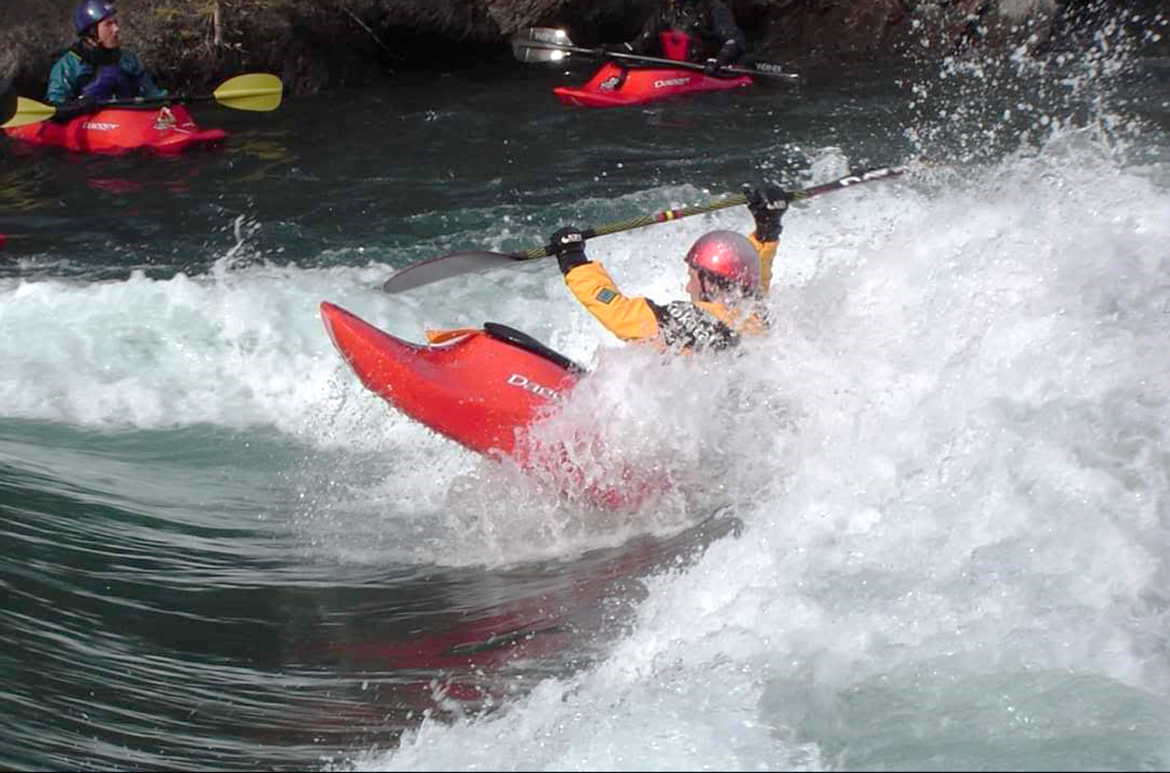 Kayak on wave