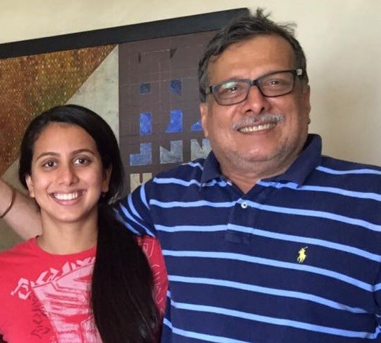 Proud father and India's swimming Champion