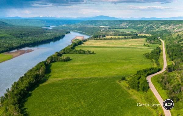 The south facing slopes along the Peace River are some of the most fertile agricultural land in the north.