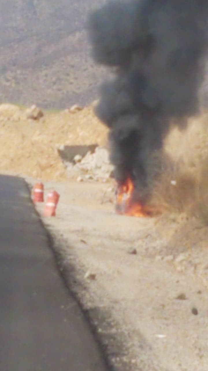 The work vehicle is licked up in flames...Complete and total loss.