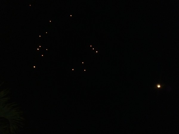 Christmas at my hometown. Light candles on the sky honoring cancer patients.