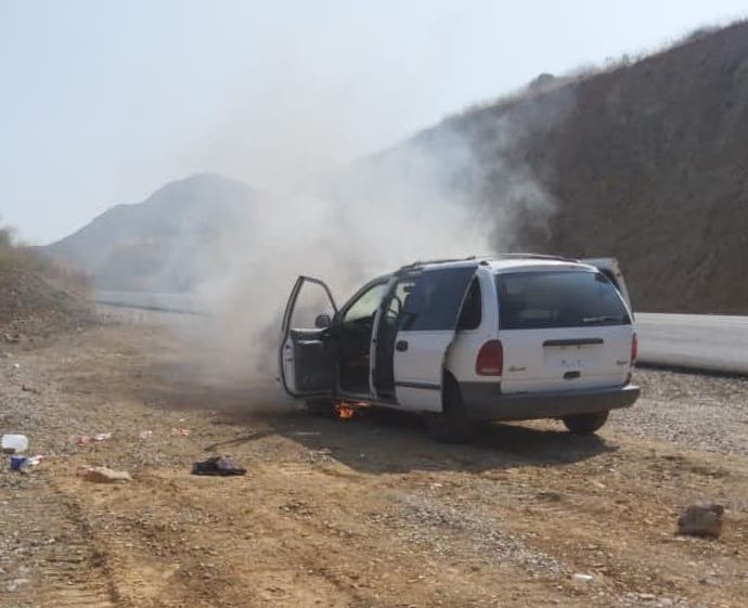 Now she's really smokin'. Notice, also, how flames are developing underneath the vehicle. She's about to go.