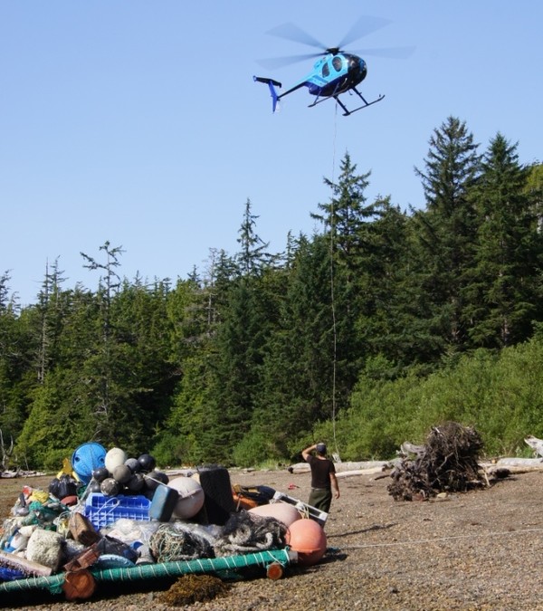 West Coast Helicopters lifts debris to sorting area in Sea Otter Cove