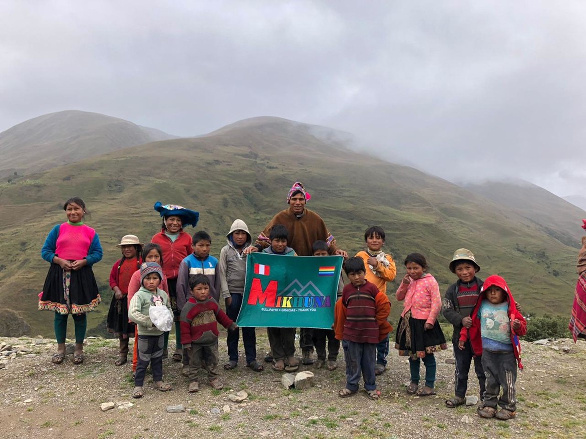 Project Director and Villagers pose for a photo