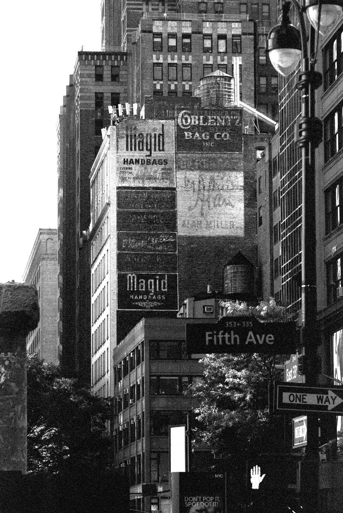 NYC painted signs, Canon AT-1, Canon FD 135mm f3.5, Arista EDU Ultra 400.