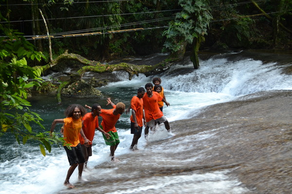 Our staff in the river