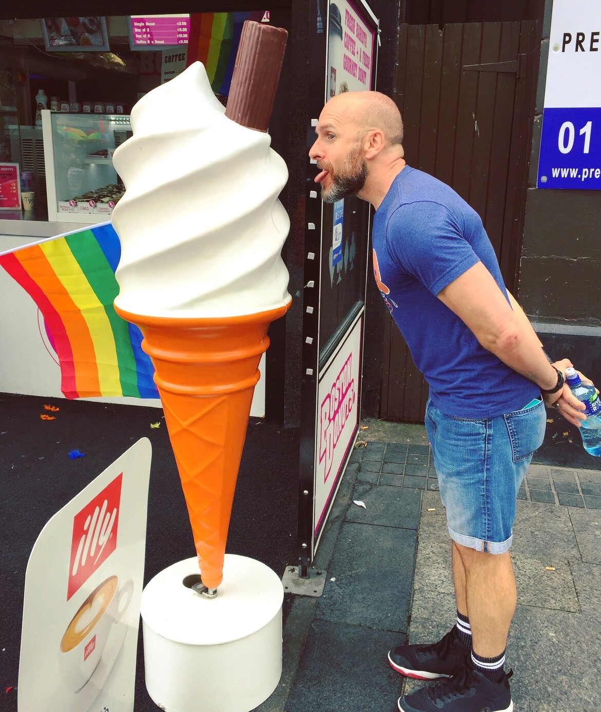 Me licking a giant 99 cone at Dublin Pride in 2019