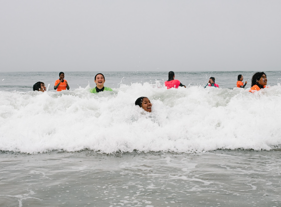 Photo of Salted Roots participants in the water