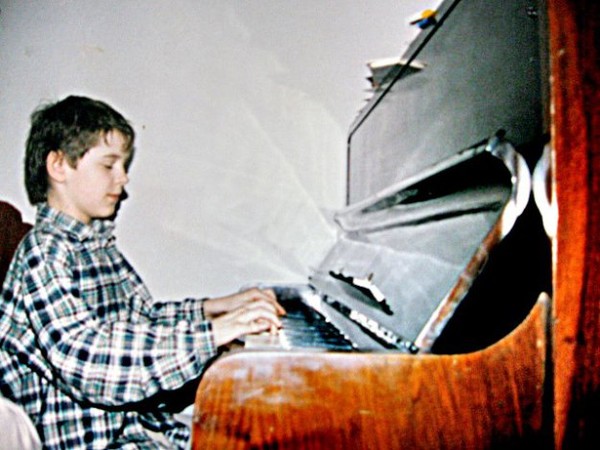 10 year old Johnny playing piano.