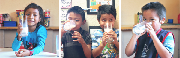 Kids drinking milk at The School of Hope.