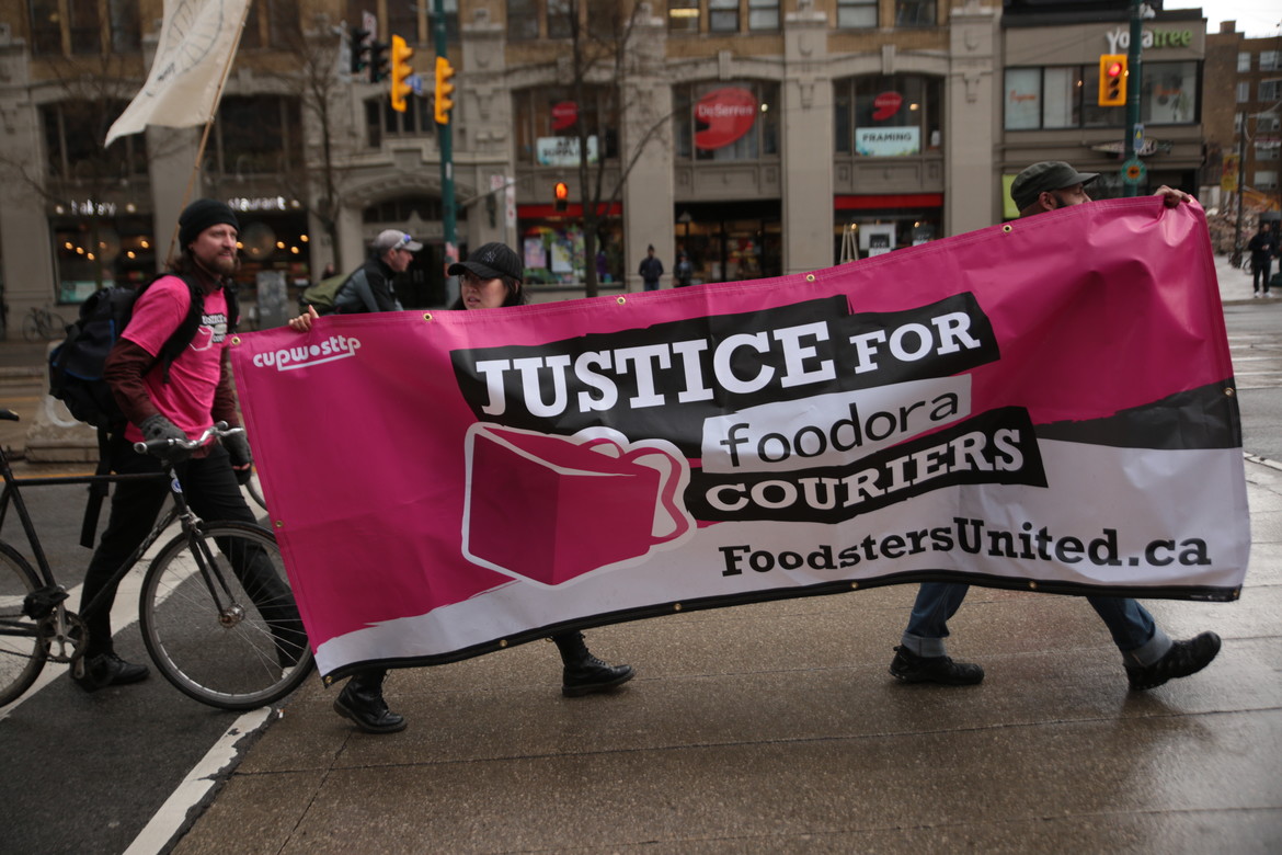 foodsters carrying our banner after telling foodora we are unionizing!