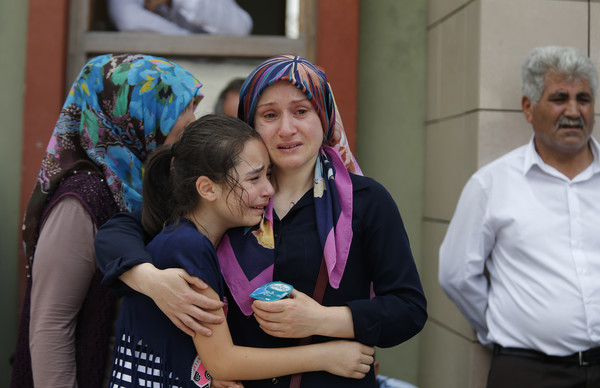 Mourners in Turkey following the attack at the International Airport