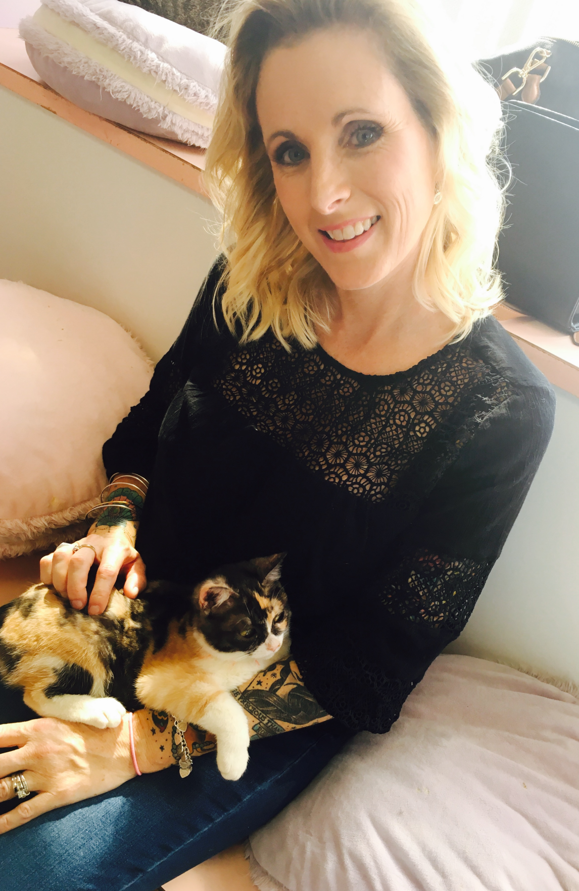 Me, in Japan, at my very first cat cafe experience!