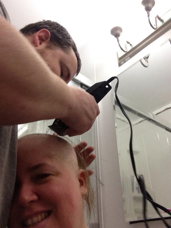 Ray shaving Jacqueline's head...she is such a trooper