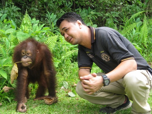Irwan with Rubin (the Orangutan)