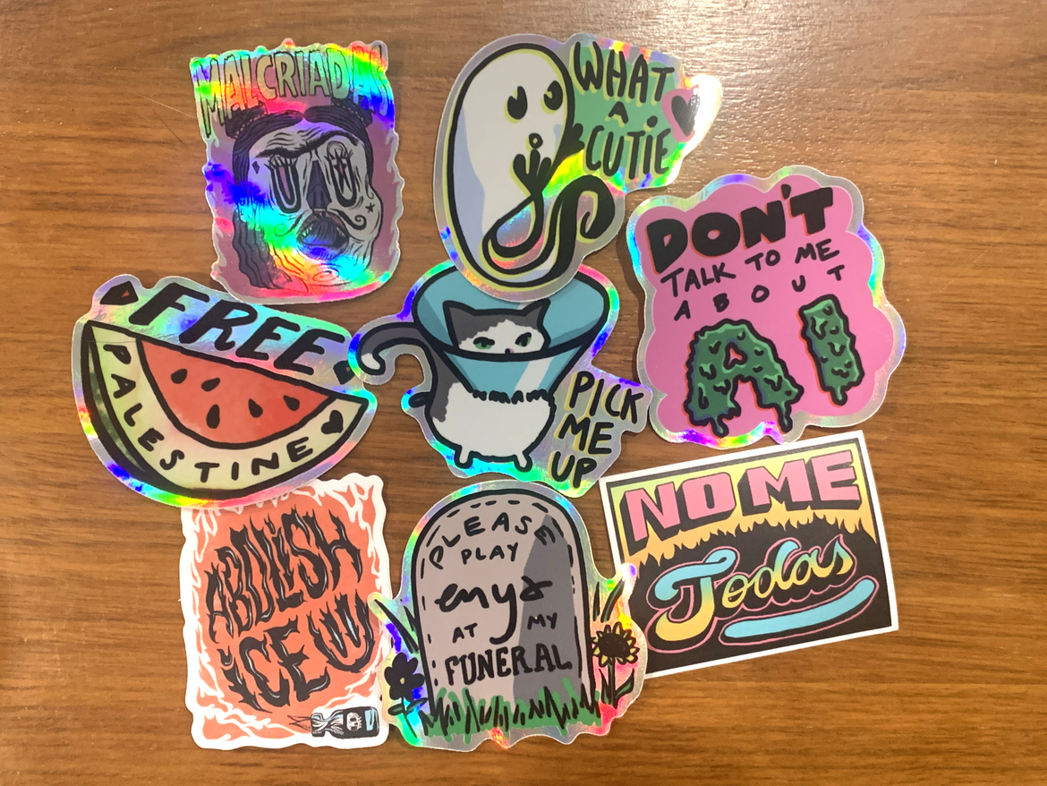eight colorful stickers with cute or leftist slogans