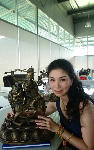 Julia with a prototype of the Dorje Shugden statue