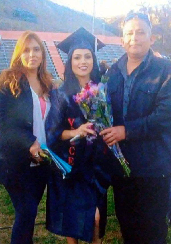 Proud parents of Jocelyn Avelica at her graduation