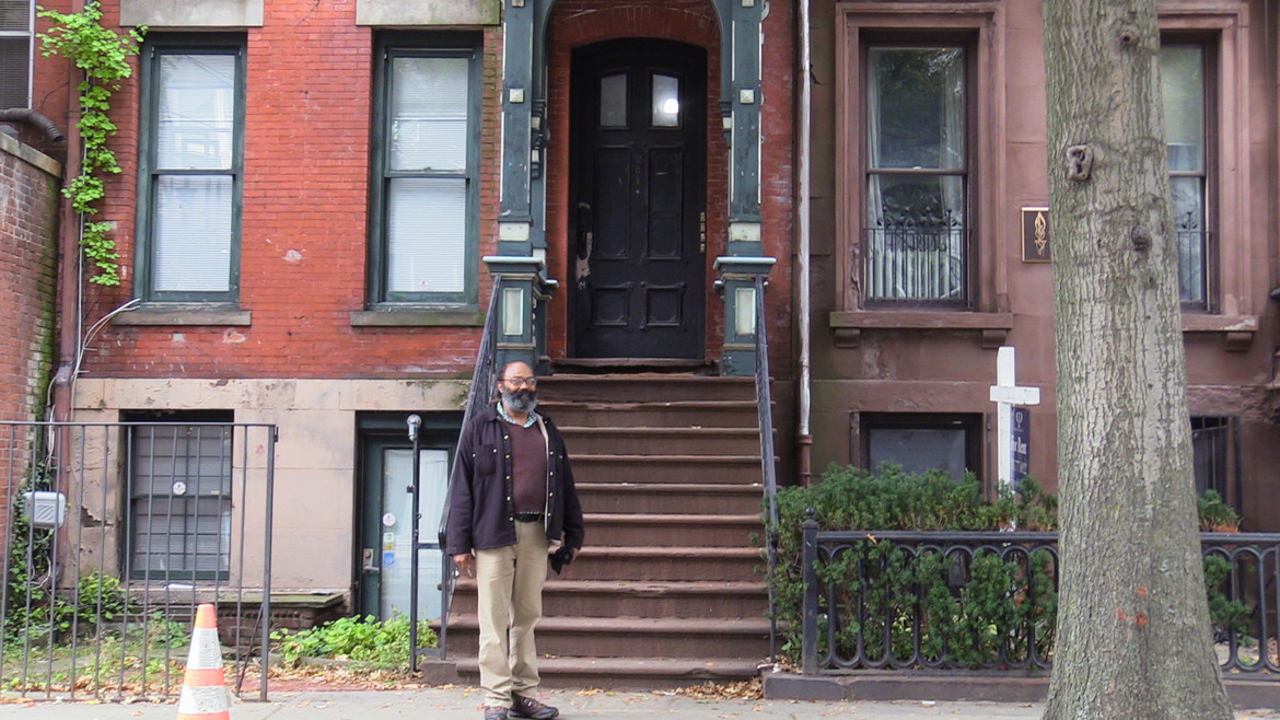 David in front of his Crown St. Apartment