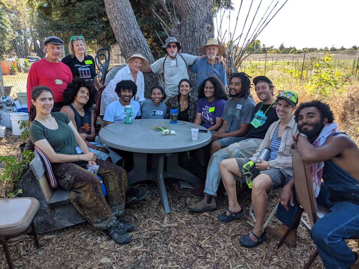 Volunteer Farmers Posing together after a good work day Volunteer Farmers Posing together after a good work day