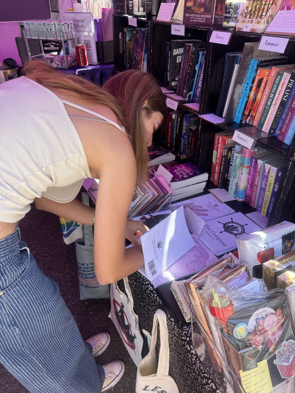 A Sophomore from RUHS Signing Her Poetry in an Issue of The Compass, the School’s Literary Magazine