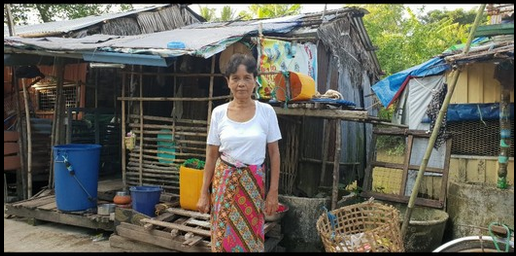 Daw Thein Ye by her current house