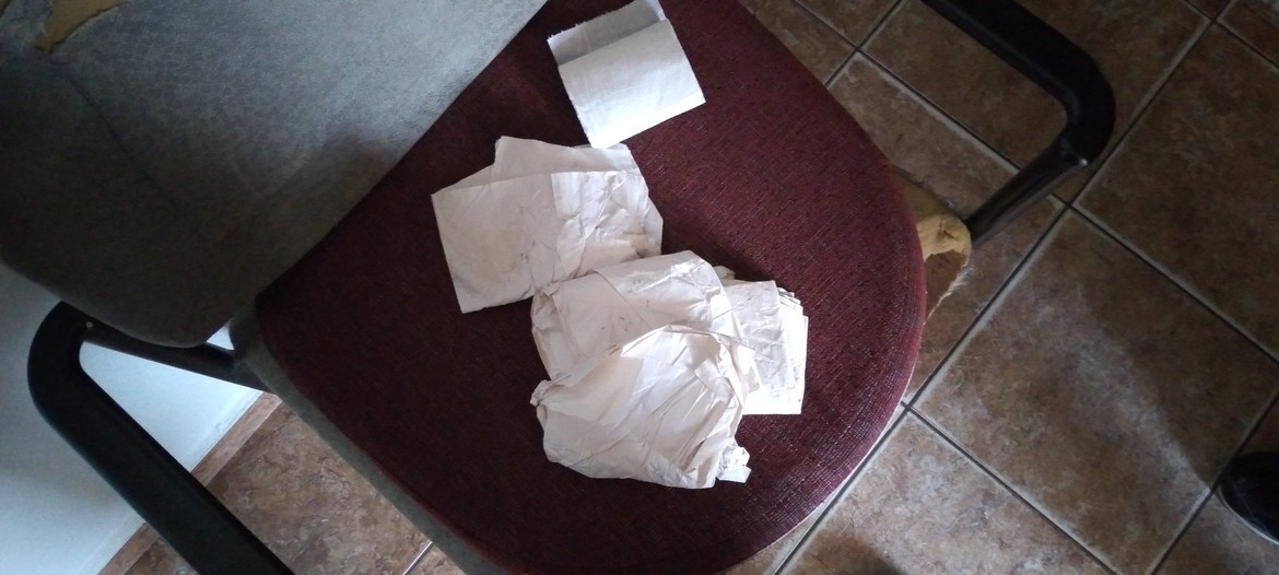 Even the cheap, rough toilet paper the guys have to use gets soaked when it rains.