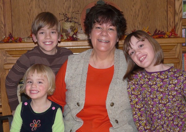 Sandy with 3 of her grandchildren