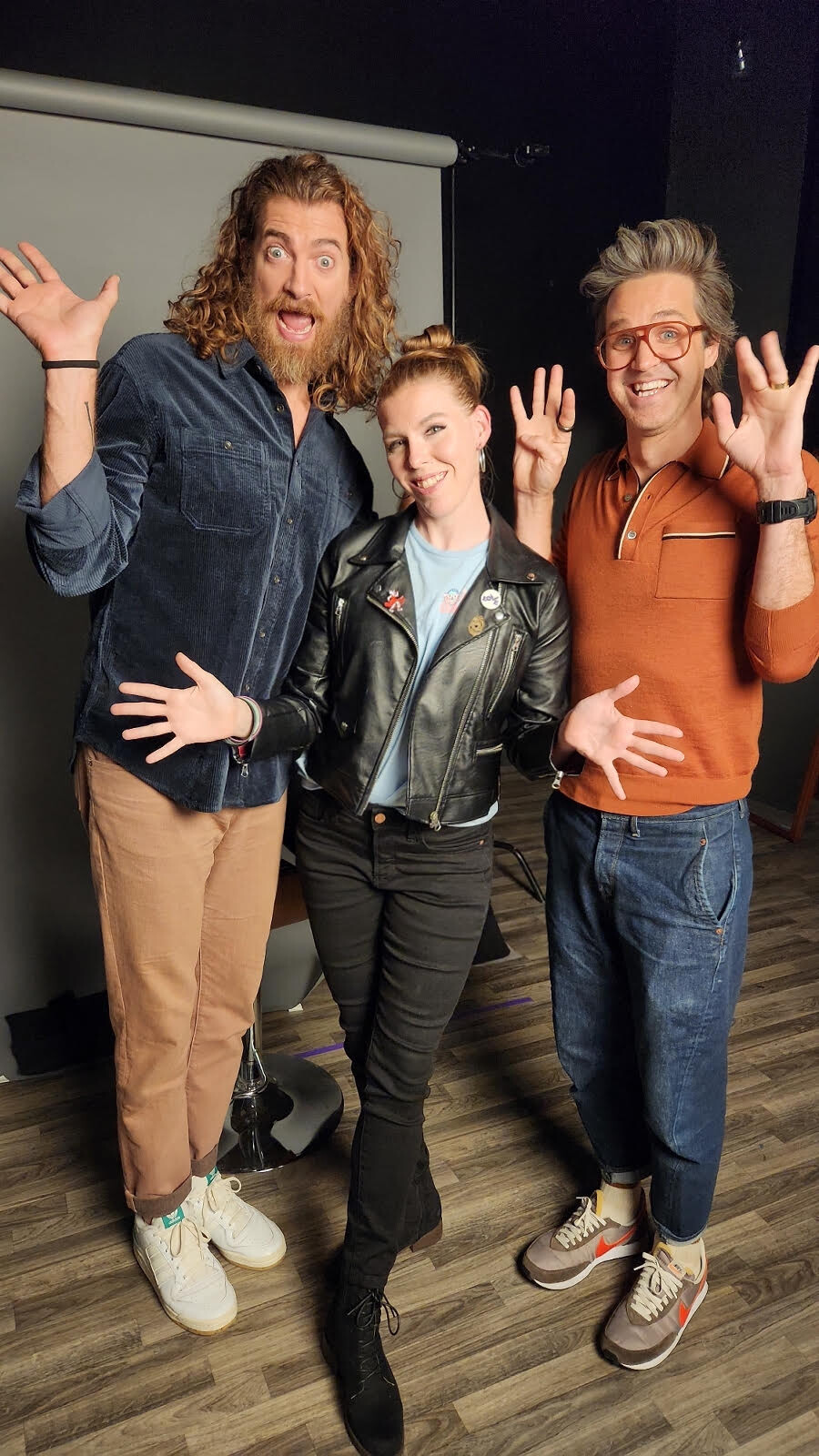 Producer/Co-director of "For The Kommunity", Rapha Conrad, with Rhett and Link post-interview (credit: Jenna Purdy; Oct. 3, 2023)