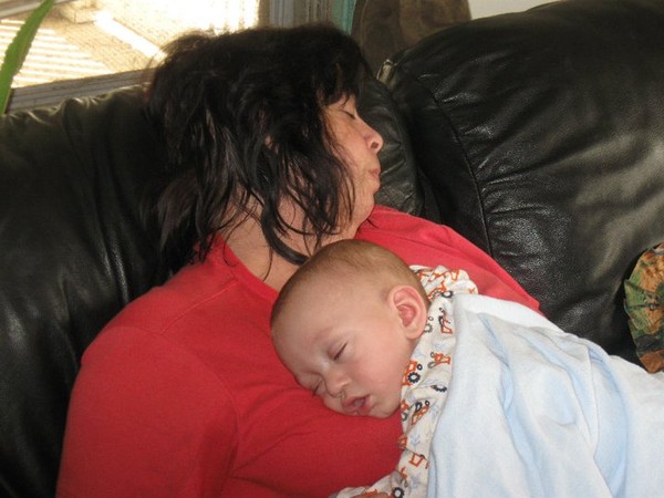 Mom holding Brayden when he finally came home