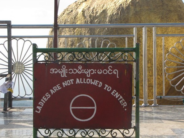 A pagoda in Burma manifests misogyny by prohibiting the women from entering the sacred area. Men can go there of course.