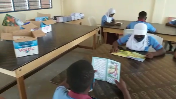 One of the classrooms was converted into a library space and we made tables and chairs.
