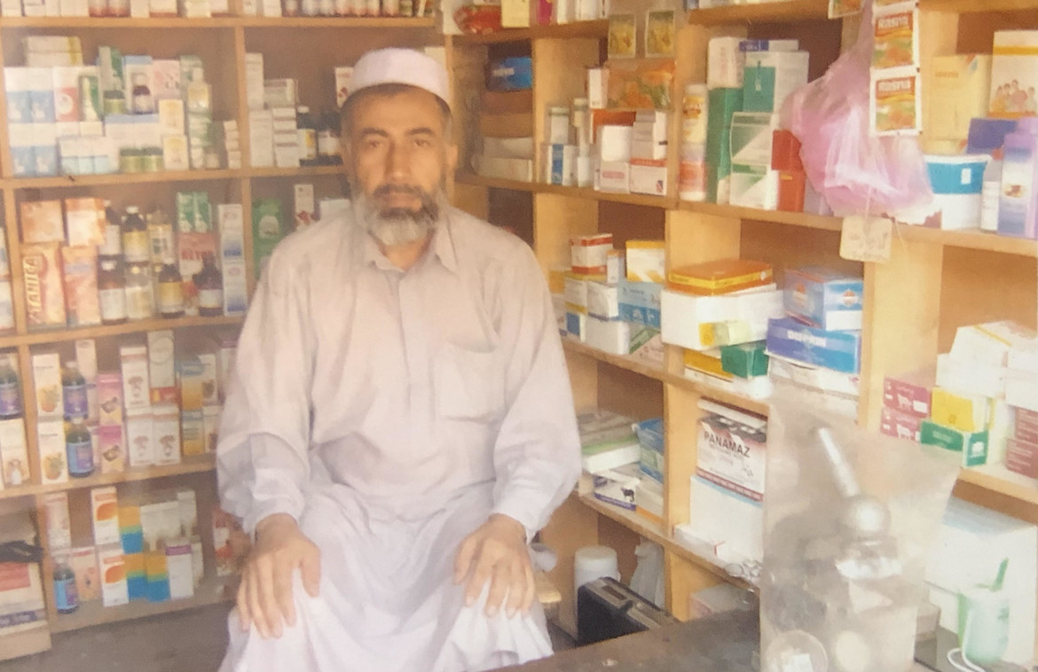 Their father at his clinic in Pakistan