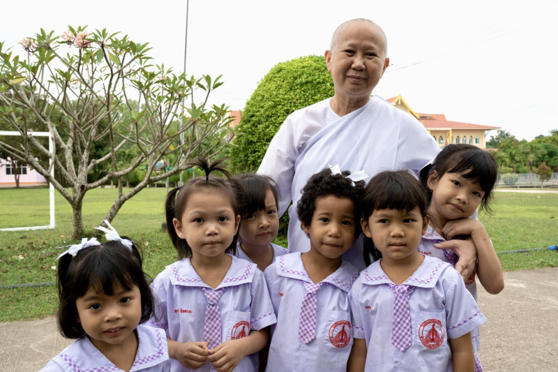 Dr Aunampai Passakchai with children