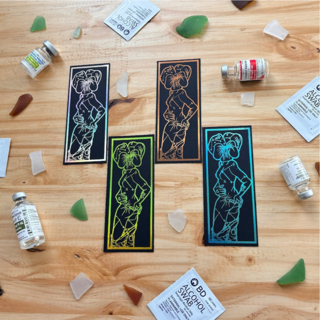 Examples of foiled bookmarks by Asher