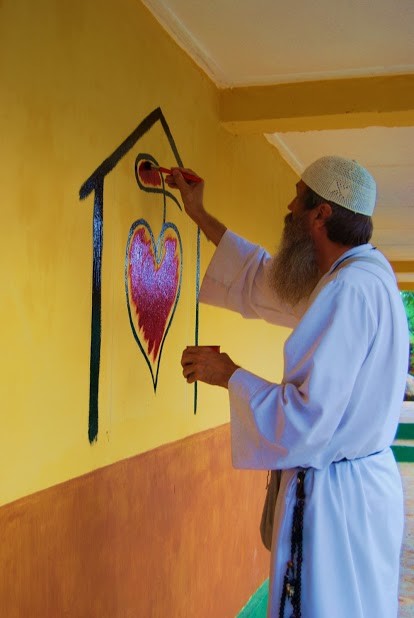 Painting our NHA Symbol on the Kabala School
