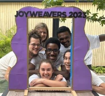 group of staff members smiling